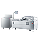 Vacuum packaging and shrink tunnel equipment for food processing