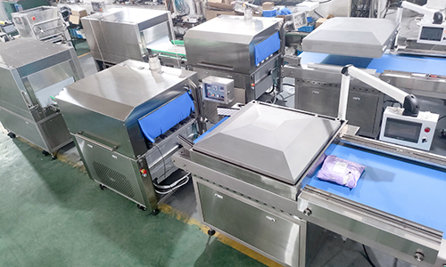 Continuous Vacuum Packaging Machine Integrated with Hot Water Shrinking and Water Removal Systems