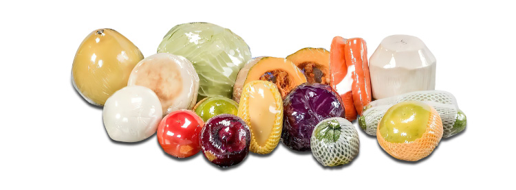 Assorted fruit and vegetables in wrapped retail packs